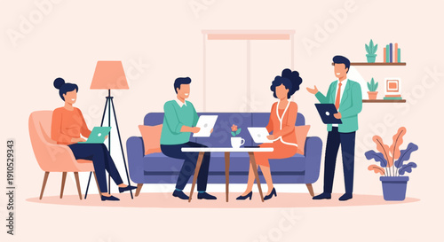 Diverse people collaborate on laptops in a modern office lounge setting