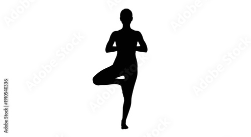 Silhouette of a person in yoga pose.