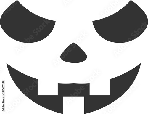 Spooky carved pumpkin face silhouette for Halloween night celebrations and decorations