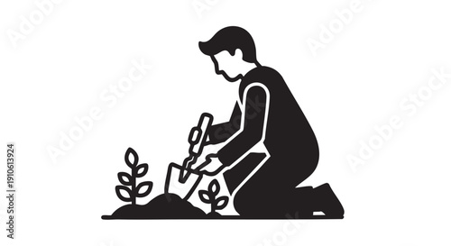 Man kneeling to plant small plants in the soil with a trowel, viewed from the side