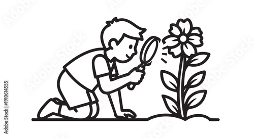A young boy examines a blooming flower closely with a magnifying glass outdoors