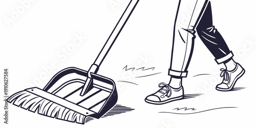 A person sweeping the floor with a broom and dustpan.