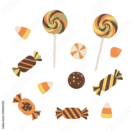 Assorted Halloween candies and lollipops arranged in a festive pattern on a clean background, viewed from directly above.