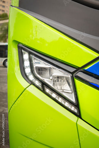 Front LED lighting assembly with angular light signature, multifaceted lens, and finish integrated into the bodywork with aerodynamic lines.