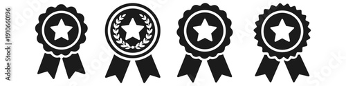 Collection of four black and white award ribbons with stars and laurel wreaths