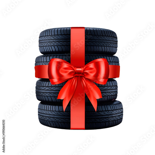 Stack of Car Tires Wrapped with Red Gift Bow Isolated on White Background