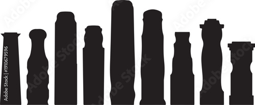 Silhouette of various black pillars on white background standing
