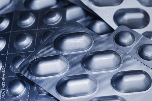 Принти на полотні Blue blister packs with capsules closeup