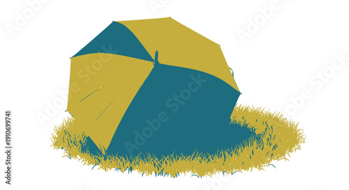 Colorful beach umbrella on grassy lawn outdoors.