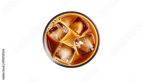 Overhead shot of iced coffee in a clear glass, showing ice cubes, foam, and liquid