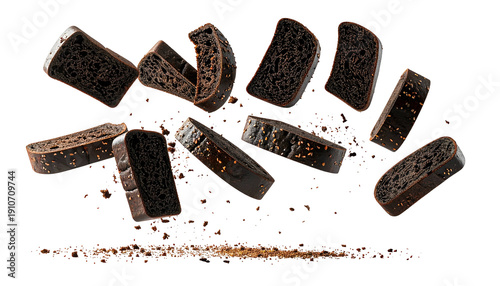 Wallpaper Mural Slices of dark bread levitating against a stark black background, with crumbs Torontodigital.ca