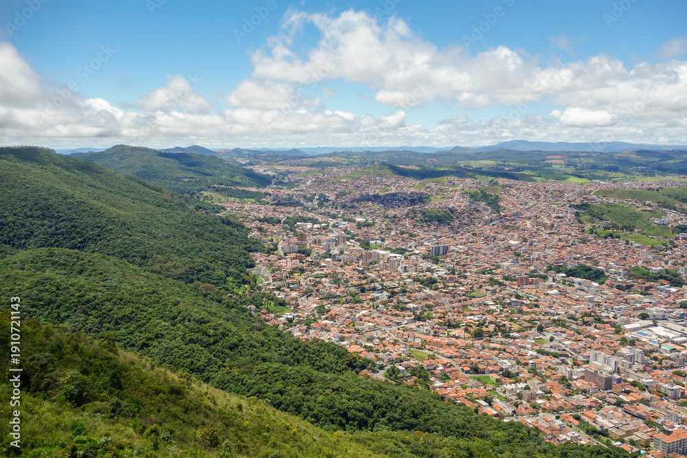 Naklejka premium wide aerial view over city of Pocos de Caldas, Minas Gerais, Brazil. and mountain landscape