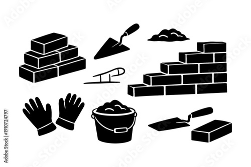 Silhouette construction tools and supplies: brick wall, trowel, gloves, bucket, cement