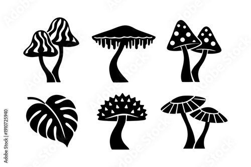Set of black silhouette mushroom and leaf illustrations