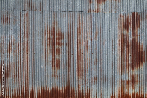 Tableau sur toile Artistic of old and rusty zinc sheet wall