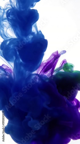 Macro Fluid Dynamics Capture extreme close-ups of the organic movement, showcasing delicate tendrils, wisps, and the detailed texture of the fluid as it expands.