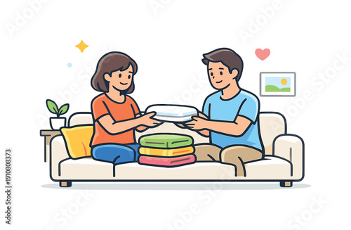 A man and woman are sitting on a sofa, happily folding clean clothes, symbolizing shared household responsibilities and partnership
