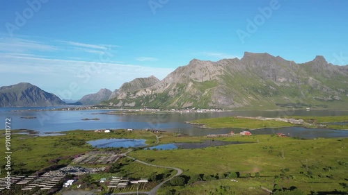 Aerial view of the Fredvang Bridges with the striking peak of Volandstind in the background. Fredvang in the Lofoten Islands in Norway.