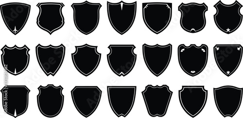Collection of Black Shield Silhouettes Isolated on White Background, Heraldic Badge Shapes for Logo, Emblem, Security, and Branding Design