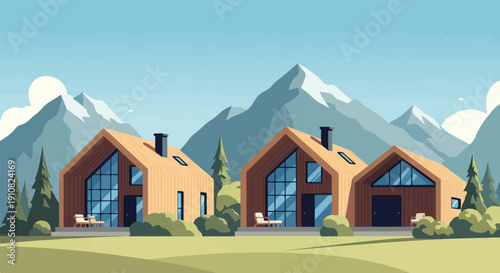 Modern wooden cabins nestled against snow-capped mountains under a clear sky