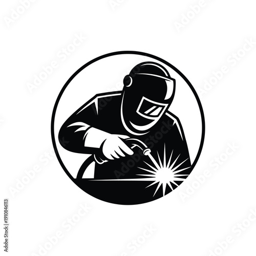 Welder silhouette within a circular frame actively working with a torch