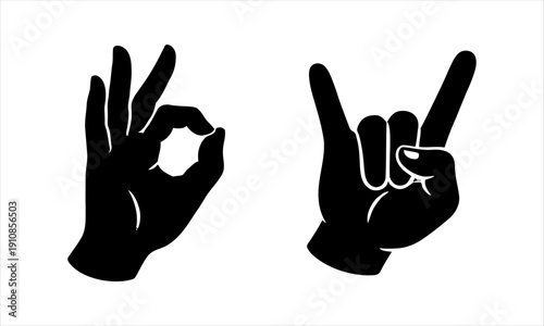 Expressive human hand gestures in silhouette, depicting 'OK' and 'rock on' symbols for communication