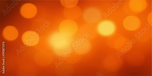 Shiny gold and orange bokeh background featuring glowing Christmas lights and blurred glitter textures for a festive holiday wallpaper design
