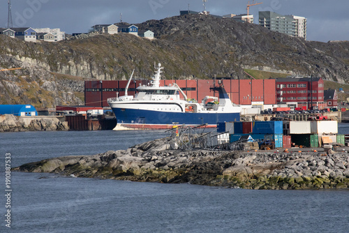 Nuuk, Greenland, September 2025, Closeup of Industry and Business Along the Shore of the Nuuk Fjord, with Housing in the Hills