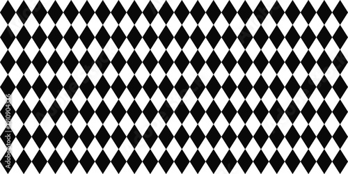 Fotografija A seamless rhombus or harlequin or argyle pattern made of black diamonds on white