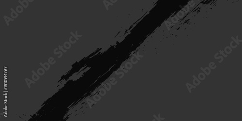 Abstract grunge background featuring a black ink splat and vintage paint stains on a dark paper texture with a grungy border element
