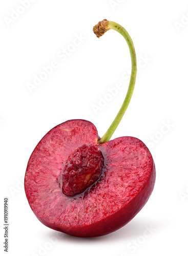 Fresh cherry half slice isolated on white.