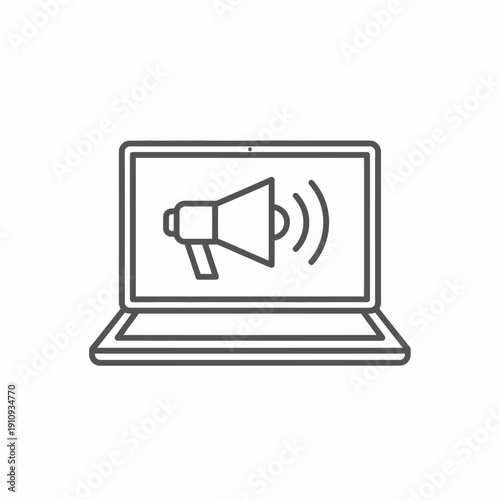 Laptop displaying a sound amplification or broadcast icon on its screen