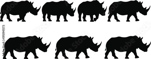 Set of rhinoceros black silhouettes in different walking side view positions isolated on white background for wildlife nature safari and conservation vector designs
