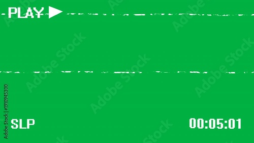 A retro VHS overlay on a green screen displays a 