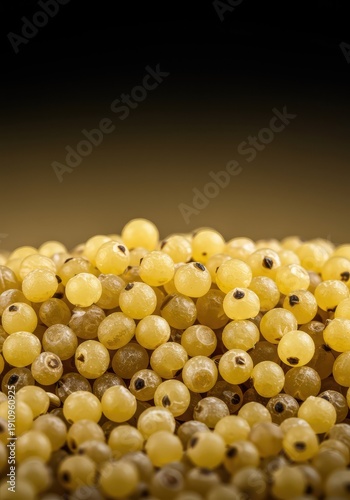 A highly detailed macro photograph emphasizing the tiny, nutritious seeds of millet, displaying rich golden texture and dry harvest ,background ,ingredient ,raw