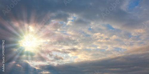 Evening sunshine background with clouds dramatic sky.