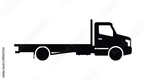 A minimalist black silhouette depicts a flatbed truck showcasing its side profile and functional design high quality professional