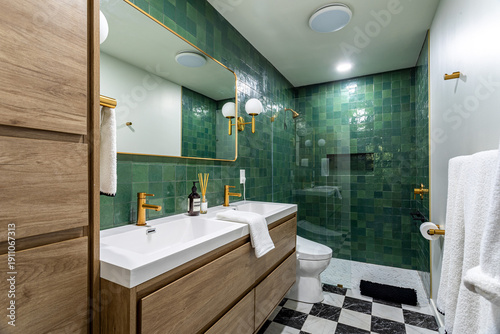 Bild auf Leinwand Modern bathroom interior with green tile walls, brass fixtures, double vanity an