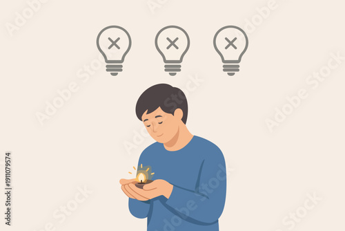 Man holding small candle idea, finding initial creative spark after multiple failures