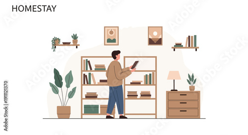 Man With Tablet Browsing Bookshelf In Minimalist Apartment