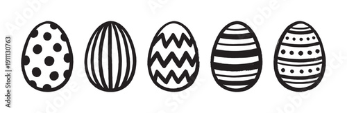 Five hand-drawn black and white Easter eggs with simple graphic patterns like stripes, polka dots, and chevrons, arranged in a row for a minimalist holiday decoration concept