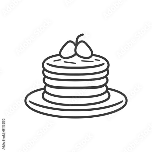 Stacked pancakes topped with fruit resting on a plate