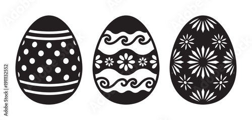 Three black and white decorated Easter eggs with various intricate patterns like polka dots, flowers, and swirls in a simple graphic illustration style for seasonal holiday designs