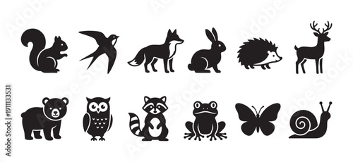 Set of twelve black woodland animal icons including a squirrel, fox, deer, bear, owl, and raccoon in a simple flat graphic silhouette style for logos or pictograms