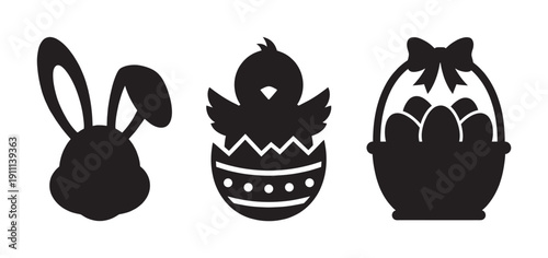 Three black Easter holiday icons featuring a bunny head, a hatching chick, and a basket of eggs in a simple, graphic silhouette style for festive spring celebrations