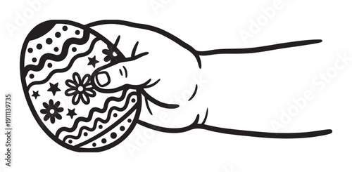 Hand holding a decorated Easter egg with flowers, stars, and wavy line patterns in a simple black and white line art illustration style for a festive spring holiday celebration