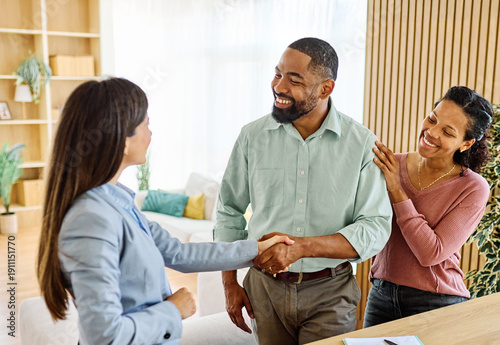 Wallpaper Mural Female Real Estate Agent Selling And Showing The Modern Apartment To His Young Clients couple and shaking hands agreement deal In The Apartment Torontodigital.ca