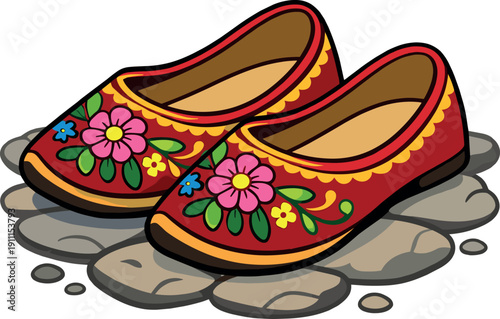 Vibrant, hand‑made traditional shoes featuring floral embroidery sit atop a stone surface, perfect for cultural fashion and artisan craft motifs