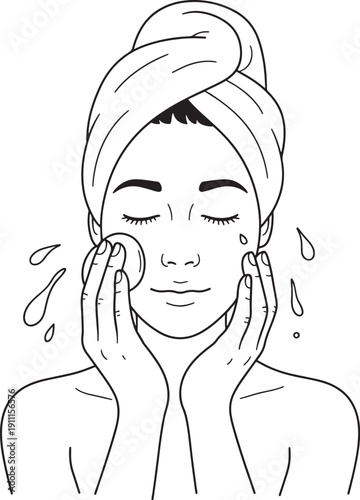 woman cleaning face with cotton pad and water drops