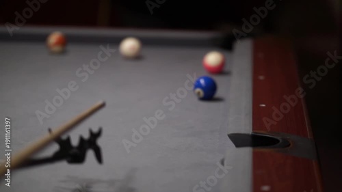 Billiards Player Using Mechanical Bridge – Close Up Pool Shot